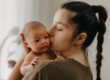 Mother holding her baby
