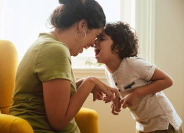 Adult and child playing 