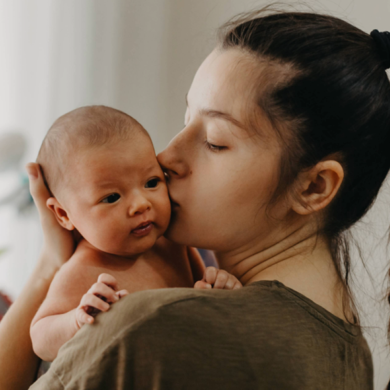 Mother holding her baby