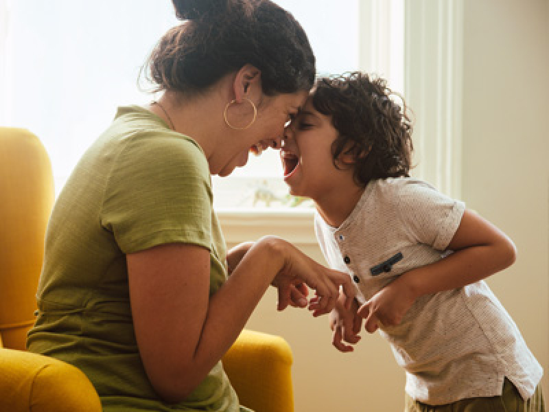 Adult and child playing 